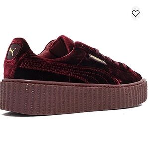 Puma X Fenty maroon velvet sneakers.